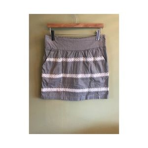 Grey skirt with white lace stripes
